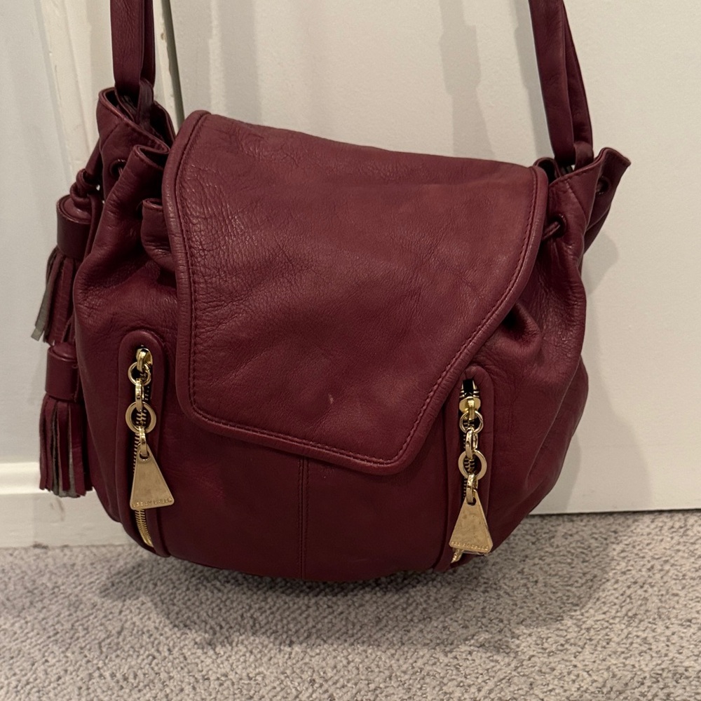 See By Chloé Burgundy Leather Shoulder Bag with Tassel & Gold Hardware